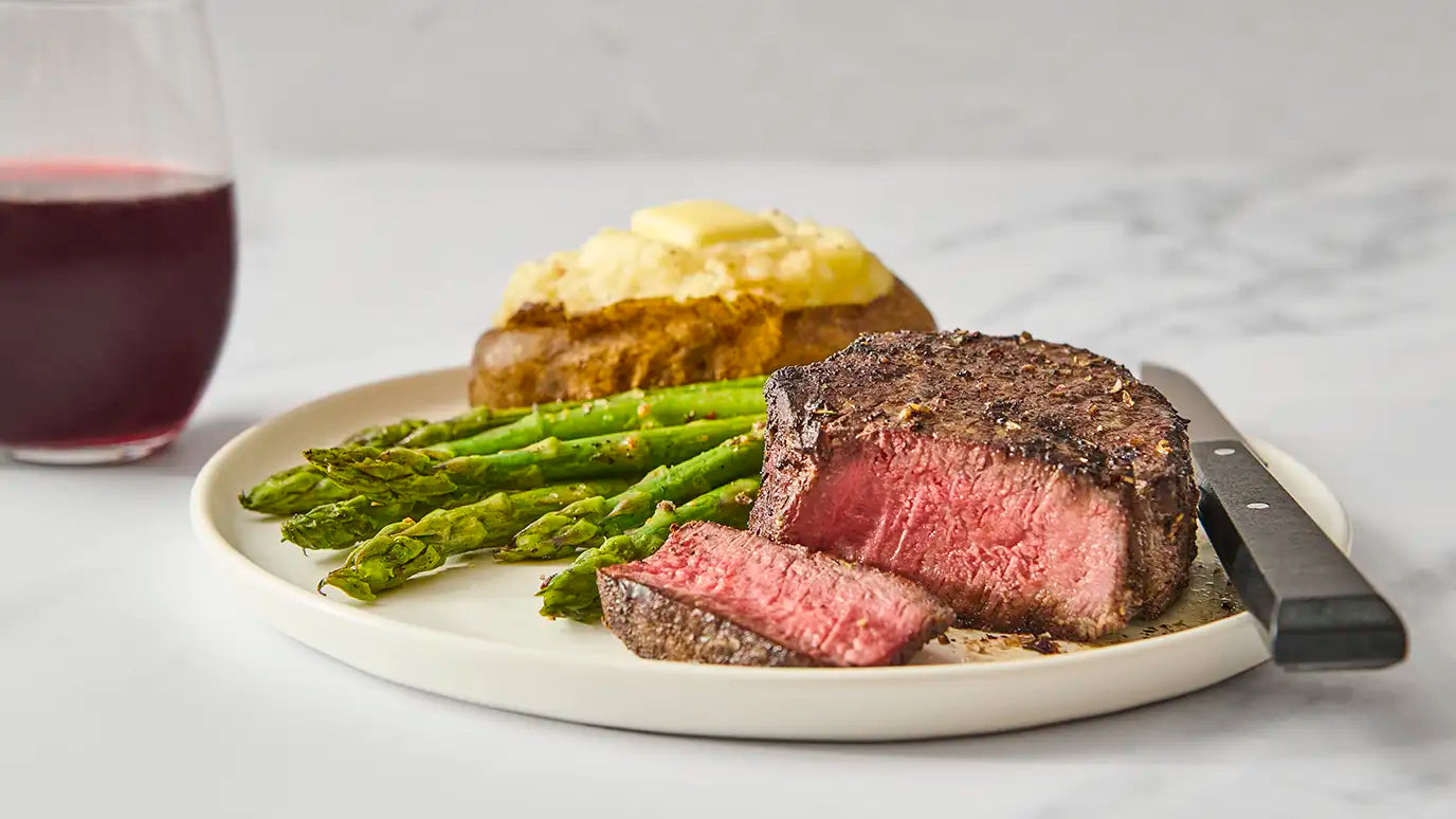 Filet mignon with asparagus and twice baked potato