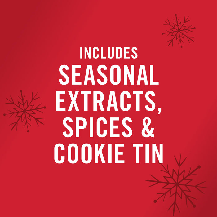 White text on a red background with snowflakes saying Includes Seasonal Extracts Spices & Cookie Tin
