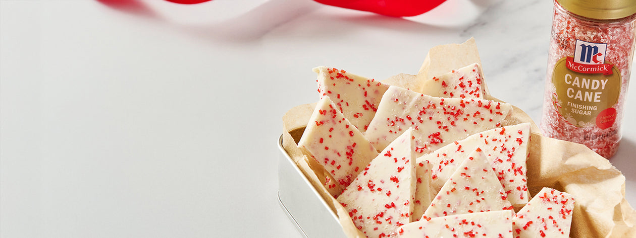 White chocolate peppermint bark topped with McCormick Candy Cane Finishing Sugar