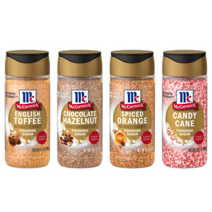 A collection of McCormick brand flavored sugar topping bottles including English Toffee, Chocolate Hazelnut, Spiced Orange, and Candy Cane.