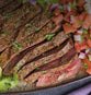 slices beef with fresh tomato salsa