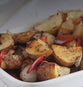 wedge potatoes with red pepper and onions from the oven
