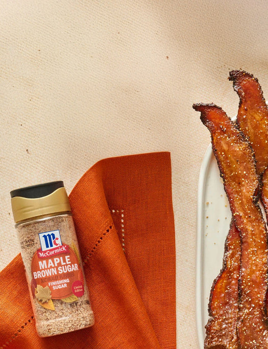Maple brown sugar bacon on plate, McCormick Maple Brown Sugar Finishing Sugar, and coffee cup