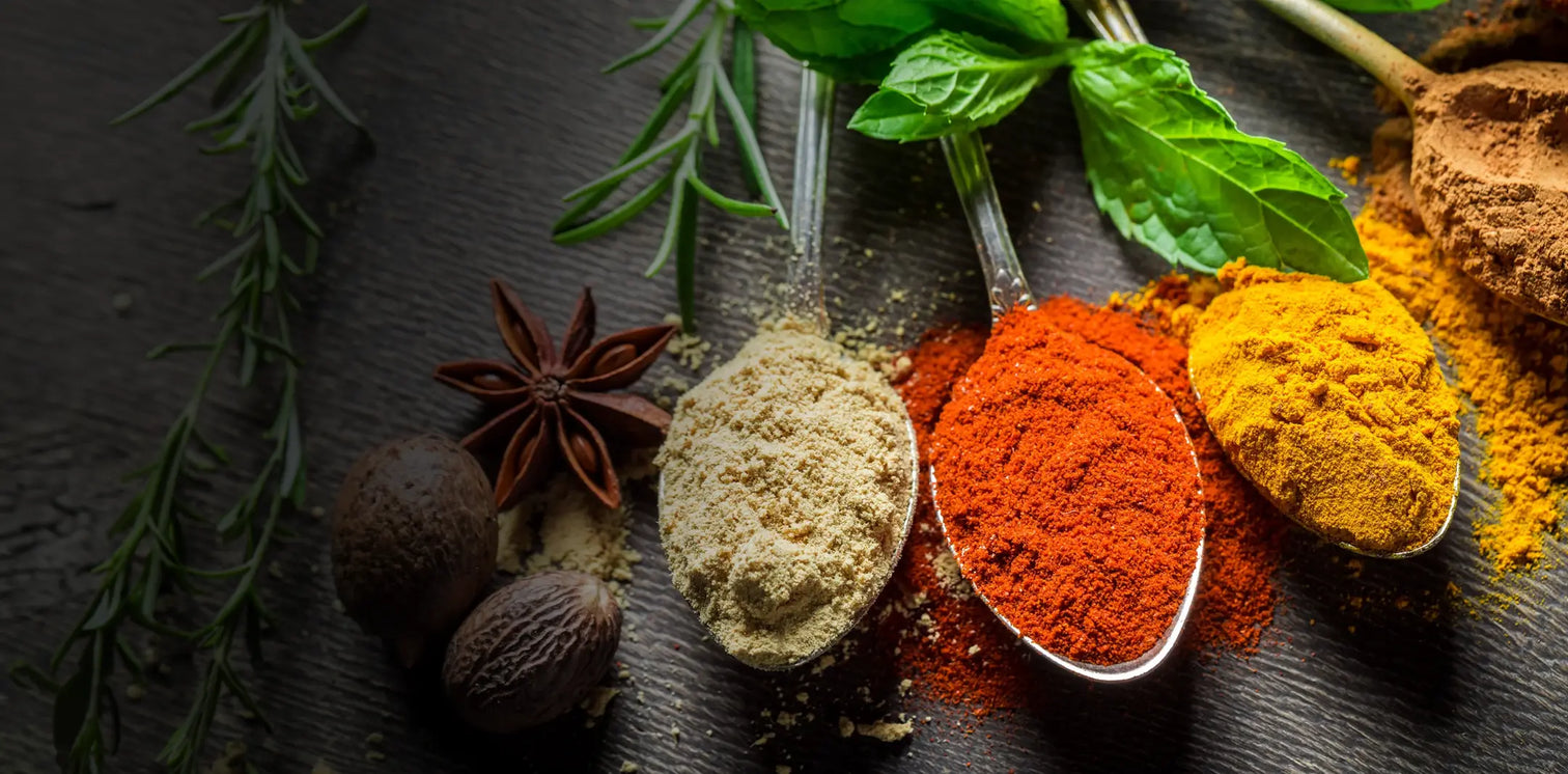 loose spices in spoons