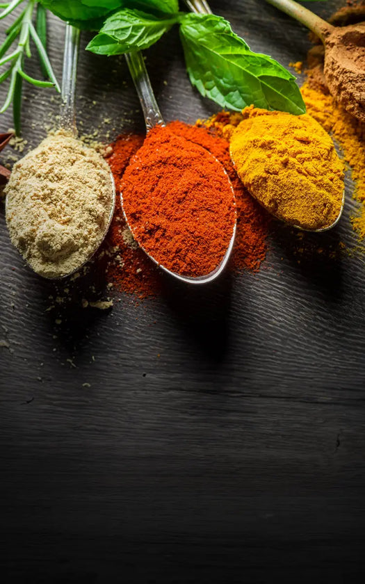loose spices in spoons