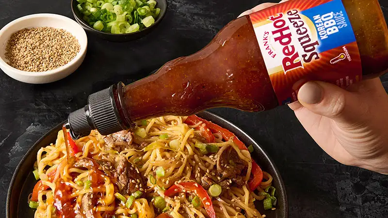 Noodle dish with Frank's Red Hot Korean BBQ Squeeze sauce