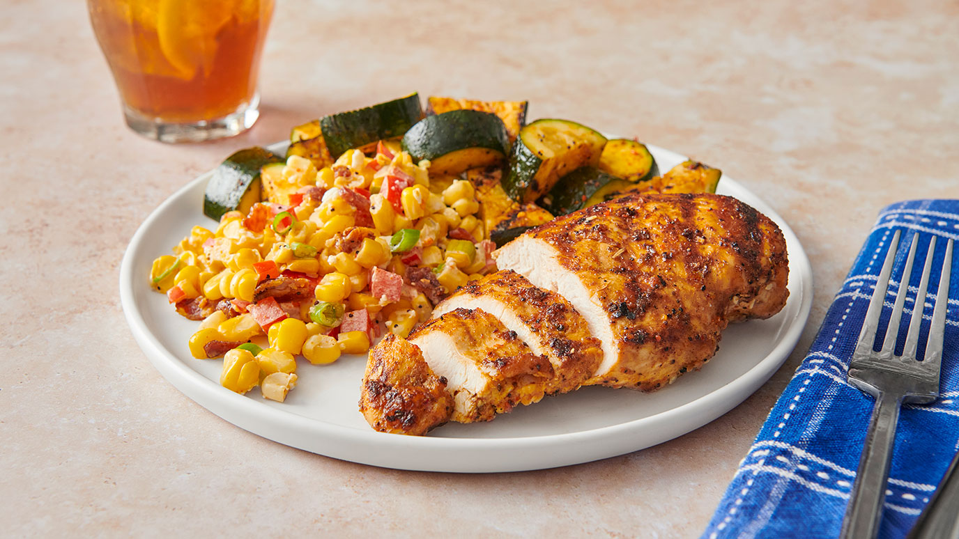 Grilled Italian chicken with corn salad and grilled zucchini