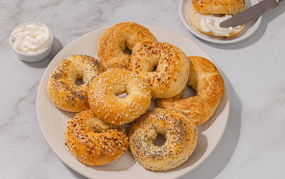 cottage cheese bagels topped with a variety of seeds and sugars
