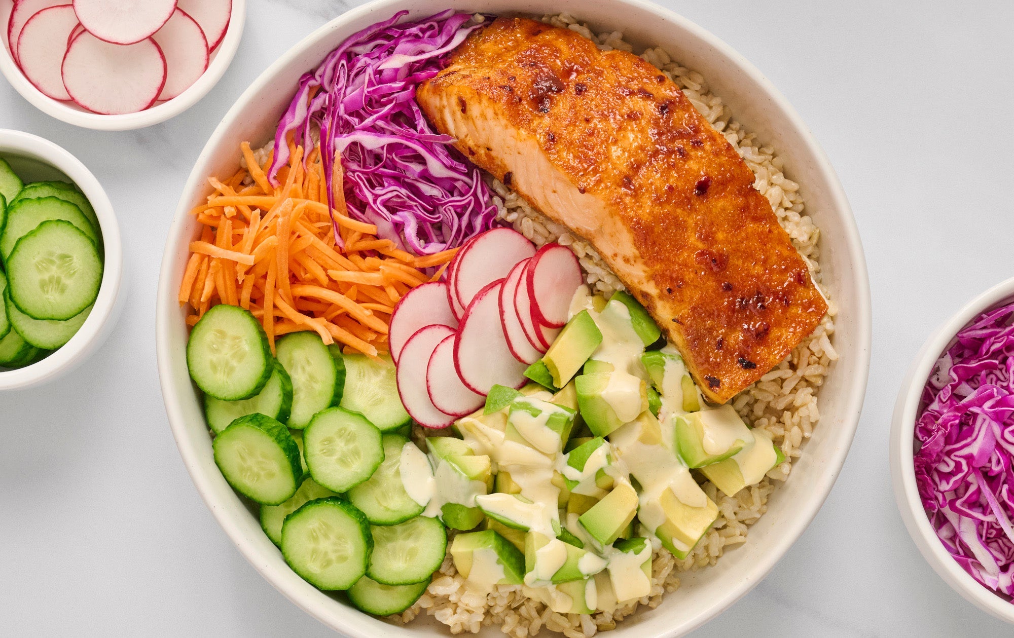 Air fryer salmon bowl with various toppings