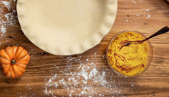 Pumpkin puree with empty pie crust