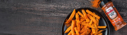 Frank's RedHot seasoning blend with a plate of french fries