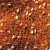 A close-up of a mixture of spices and seeds.
