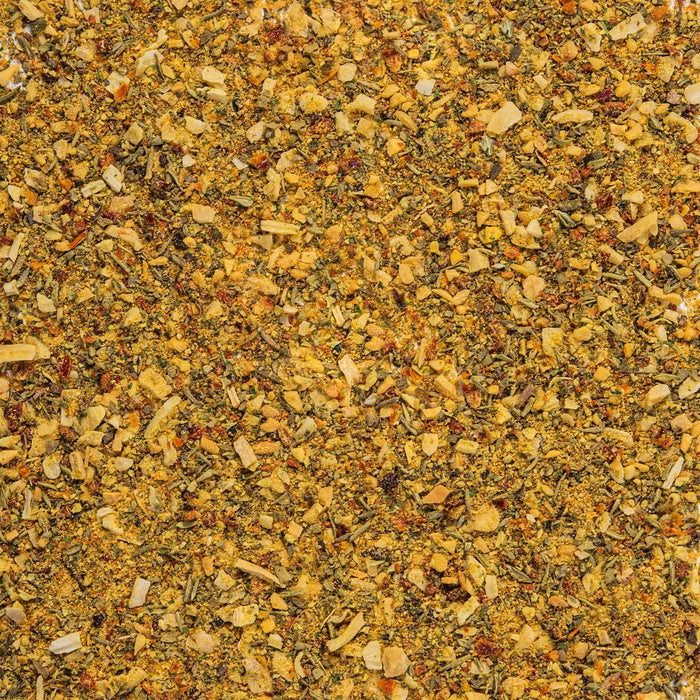 A close-up of a mixture of dried herbs and spices.