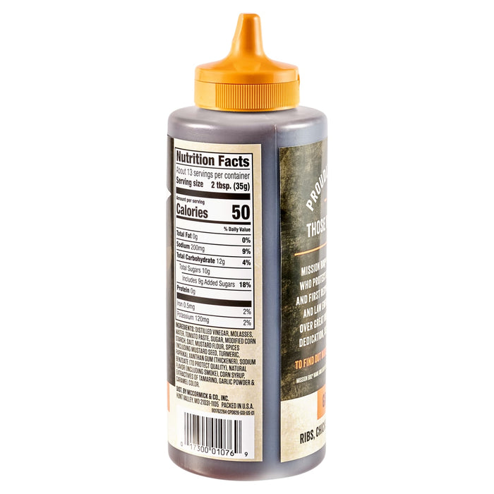 A bottle of Kinder's Roasted Garlic BBQ Sauce with a view of the nutrition facts label.