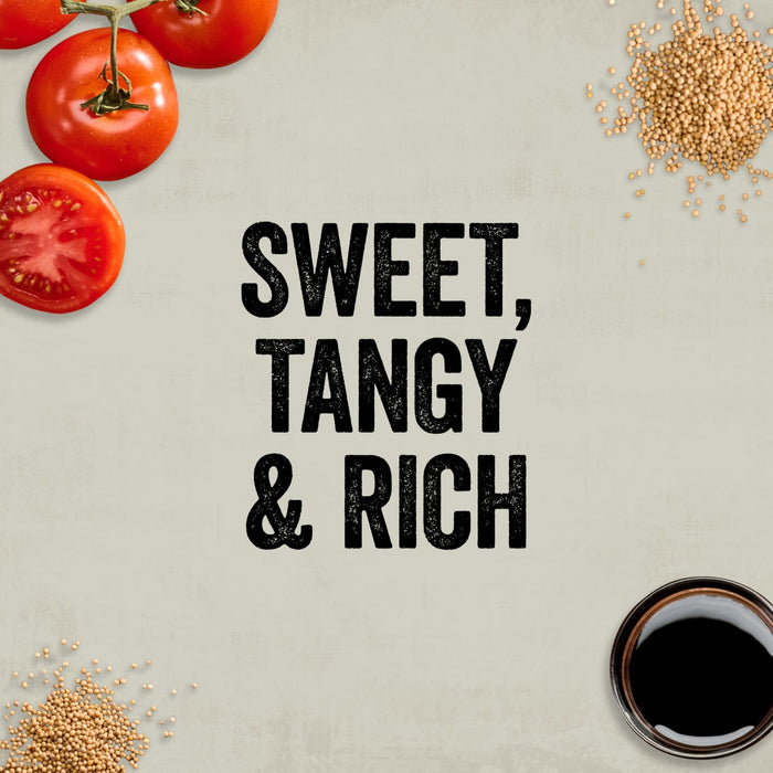 An overhead view showcasing ingredients like fresh tomatoes, mustard seeds, and a dark rich sauce, illustrating the sweet, tangy, and rich flavor profile of Mission Bbq Memphis Belle 15.5 Oz.