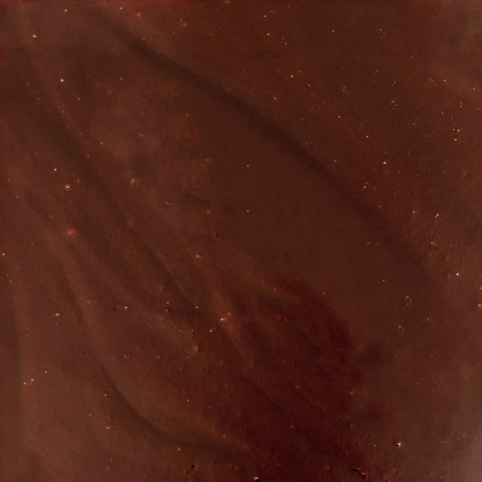 A close-up view of the rich, dark brown Mission Bbq Blue Ridge Smoky Mountain 15 Oz sauce, showing its smooth texture with subtle swirls and tiny glistening specks.