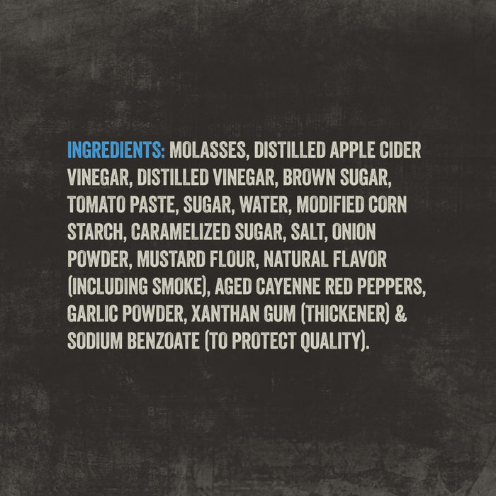 The ingredients list for Mission Bbq Blue Ridge Smoky Mountain 15 Oz is displayed on a dark textured background, detailing components such as molasses, various sugars, tomato paste, vinegars, and spices including smoke flavor and aged cayenne red peppers.