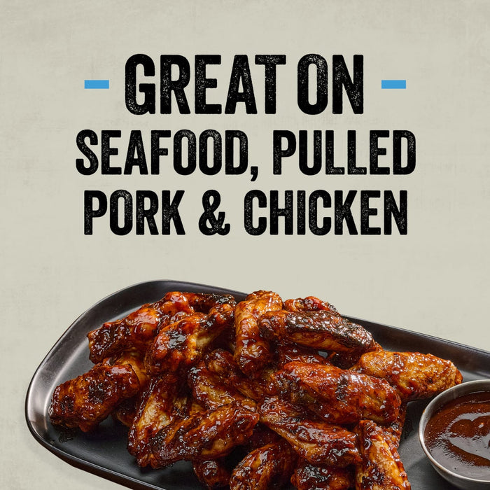 A plate of glazed chicken wings and a side of sauce, with text indicating that Mission Bbq Blue Ridge Smoky Mountain 15 Oz is great on seafood, pulled pork, and chicken