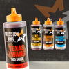 A bottle of Mission Bbq Texas Twang Bold Barbecue Sauce Plastic Squeeze Bottle 14.5 Oz is featured in the foreground, with three other flavor varieties from the same brand arranged behind it.
