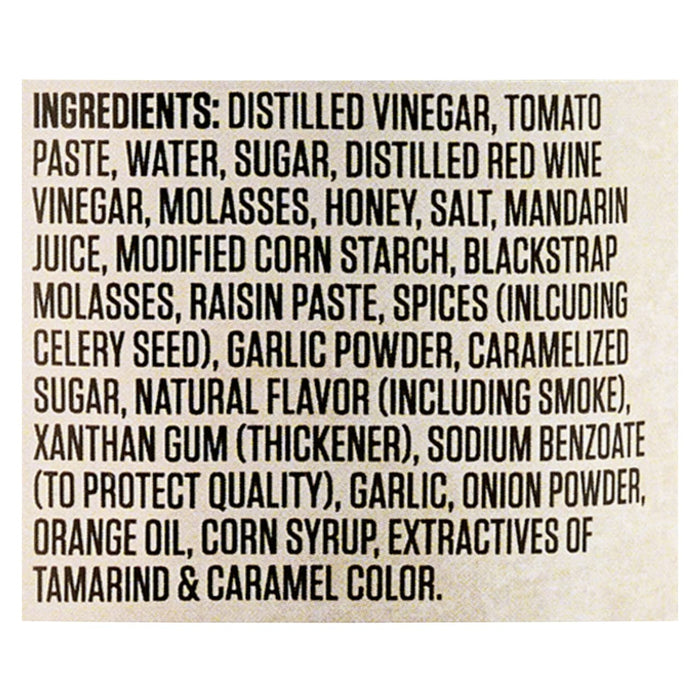 The image shows the ingredient list for a food product, including items like distilled vinegar, tomato paste, sugar, and spices.
