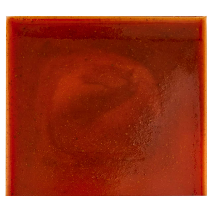 A square tile with a glossy, reddish-brown glaze and subtle variations in color.