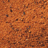 A close-up of a mixture of spices, including salt, pepper, and paprika.