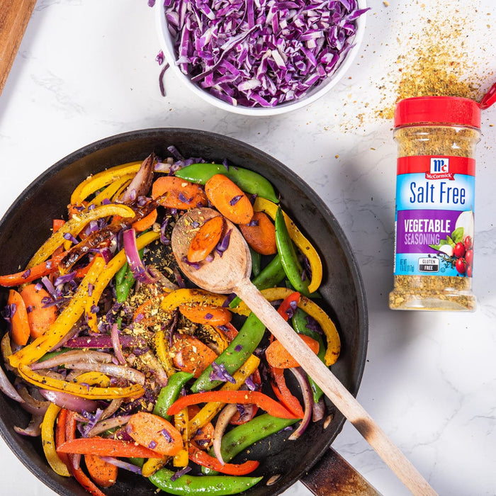 A skillet of colorful vegetables seasoned with McCormick Salt Free Vegetable Seasoning.