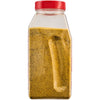 A container of yellow seasoning with black specks, likely a spice blend for cooking.