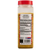 A bottle of Goya Adobo seasoning with its nutrition facts label visible.