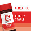 A jar of Lawry's Seasoned Salt with the words 'Versatile Kitchen Staple' in the background.
