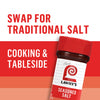 A container of Lawry\'s Seasoned Salt with the text Swap for traditional salt, cooking &amp; tableside above it.