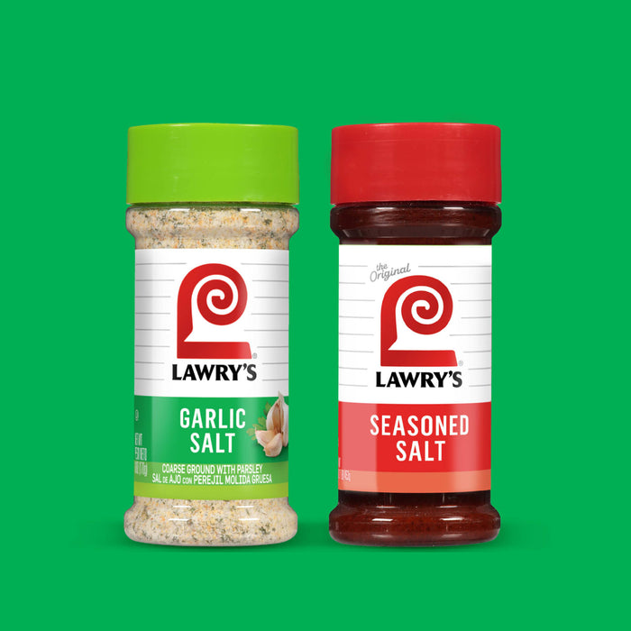 Two bottles of Lawry's seasonings, Garlic Salt and Seasoned Salt, are displayed against a green background.