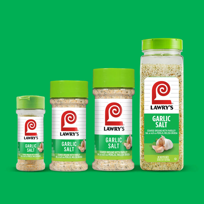 Four different sizes of Lawry's Garlic Salt containers are displayed against a green background.