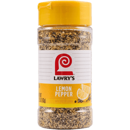 A bottle of Lawry's Lemon Pepper with zest of lemon.