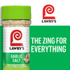 A Lawry\'s Garlic Salt container with a green lid and a white label with the Lawry\'s logo and the text The Zing for Everything on a green background.