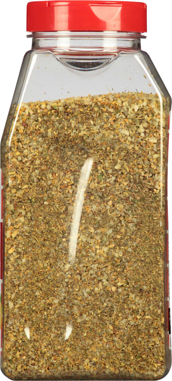 A clear plastic jar with a red lid filled with a blend of herbs and spices.