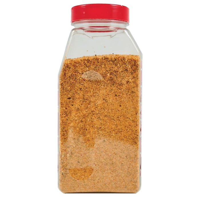 A glass jar with a red lid filled with a brown spice blend.