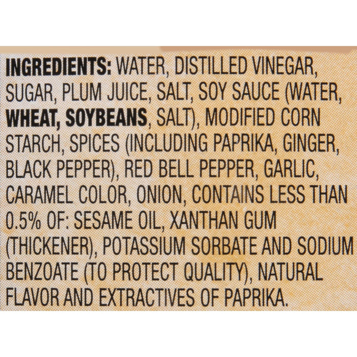 A list of ingredients for a product including water distilled vinegar sugar plum juice salt soy sauce wheat soybeans modified corn starch spices red bell pepper garlic caramel color onion sesame oil xanthan gum potassium sorbate sodium benzoate and natural flavor.