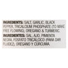 The image shows the ingredient list for a seasoning blend, including salt, garlic, black pepper, tricalcium phosphate, oregano, and turmeric, in both English and Spanish.