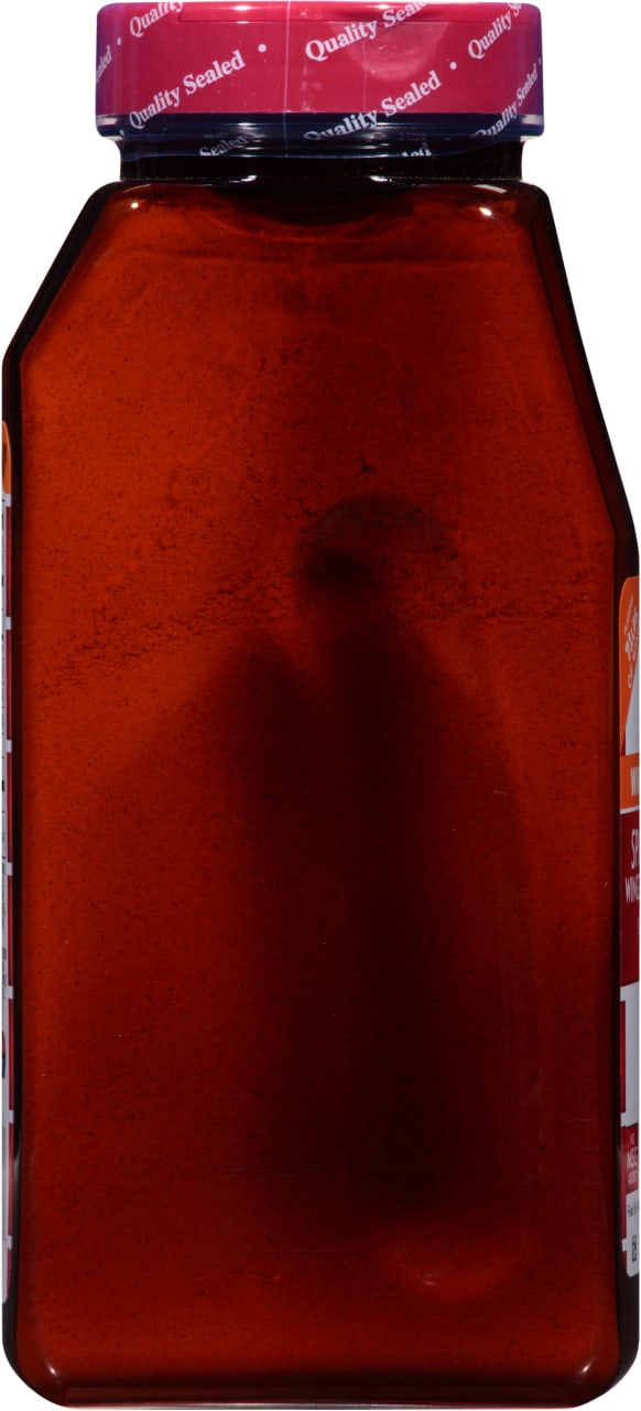 A brown glass bottle of Franks RedHot Original Hot Sauce.