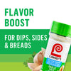 A Lawry's Garlic Salt container is featured in an advertisement promoting flavor boost for dips, sides, and breads.