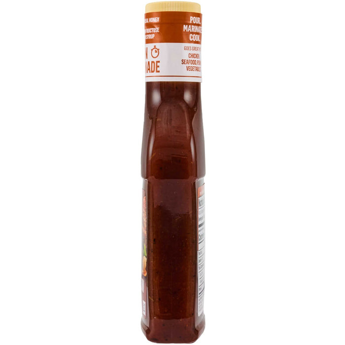 A bottle of Sweet Baby Ray's barbecue sauce is shown.