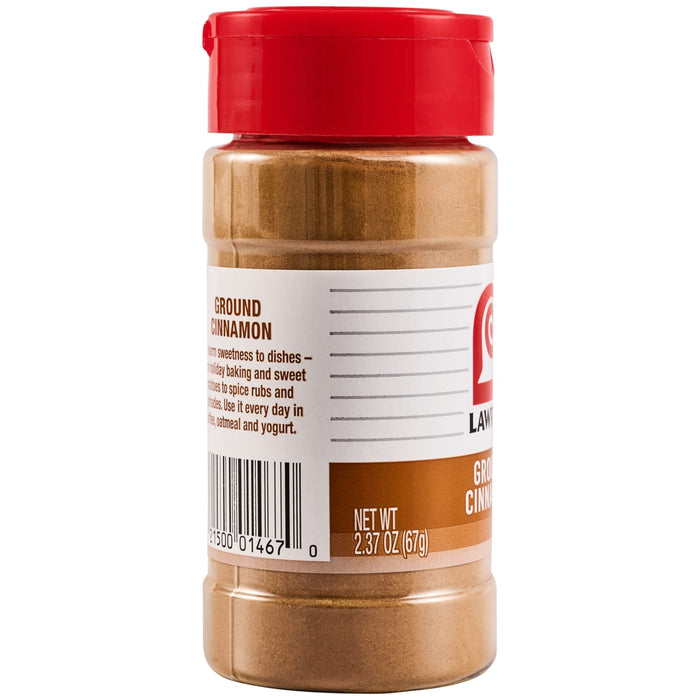 A clear plastic spice jar with a red lid, containing Lawry'S Cinnamon Ground 2.37 Oz, with the label showing the brand name and product type.
