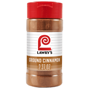 A clear plastic bottle of Lawrys Cinnamon Spice Ground 2.37 Oz featuring a red flip top lid and a white label with the iconic red L logo.