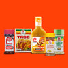 This image features an assortment of Lawrys spices and seasonings including seasoned salt taco seasoning Cuban Style Mojo marinade lemon pepper and garlic salt.