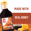['A bottle of Lawry\'s Honey Teriyaki Marinade, highlighting its Made with Real Honey feature and No High Fructose Corn Syrup claim.']