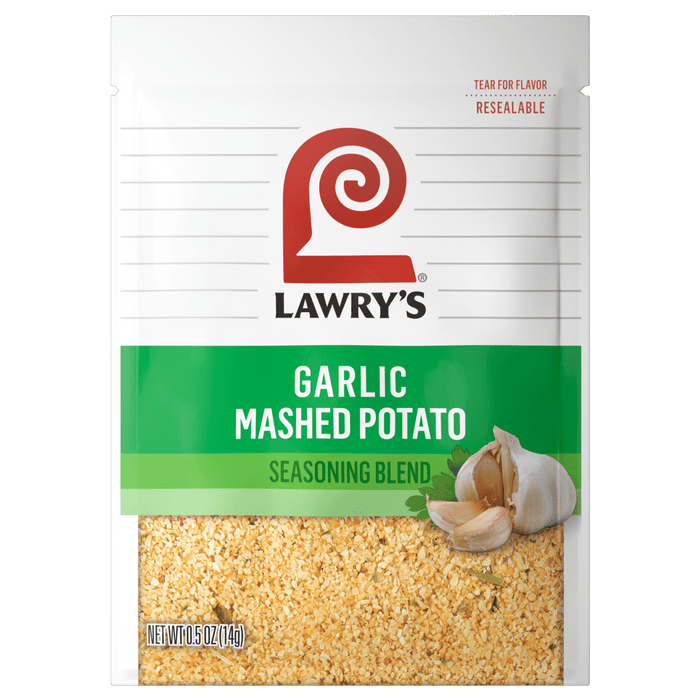 ["A Lawry's Garlic Mashed Potato Seasoning Blend packet with a close-up of the seasoning and garlic cloves."]