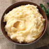 ['A bowl of mashed potatoes.']