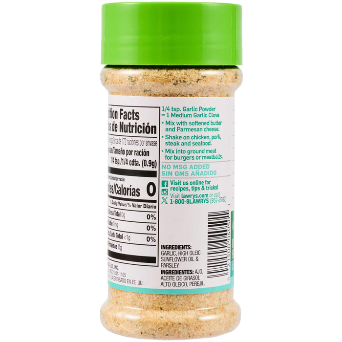 A bottle of a spice blend with a green lid shows the nutrition facts and ingredients.