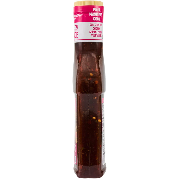 A bottle of Lee Kum Kee Chiu Chow Chili Oil is shown, featuring visible chili flakes suspended in oil.